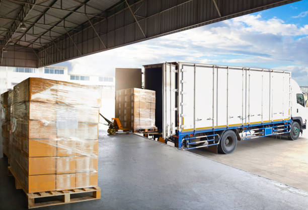Logistics team working on shipping paperwork